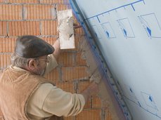 3. Intégration du non-tissé à l’enduit
