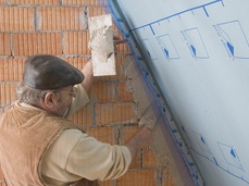 3. Intégration du non-tissé à l’enduit